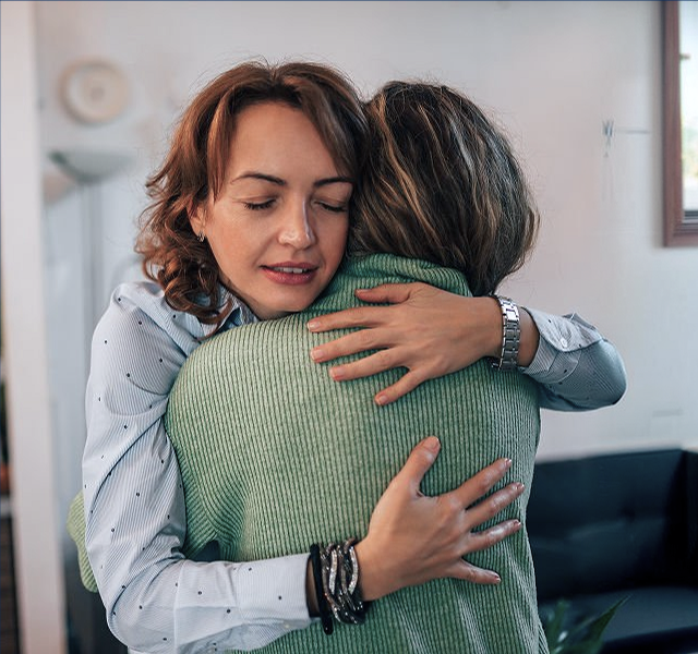 two women hugging