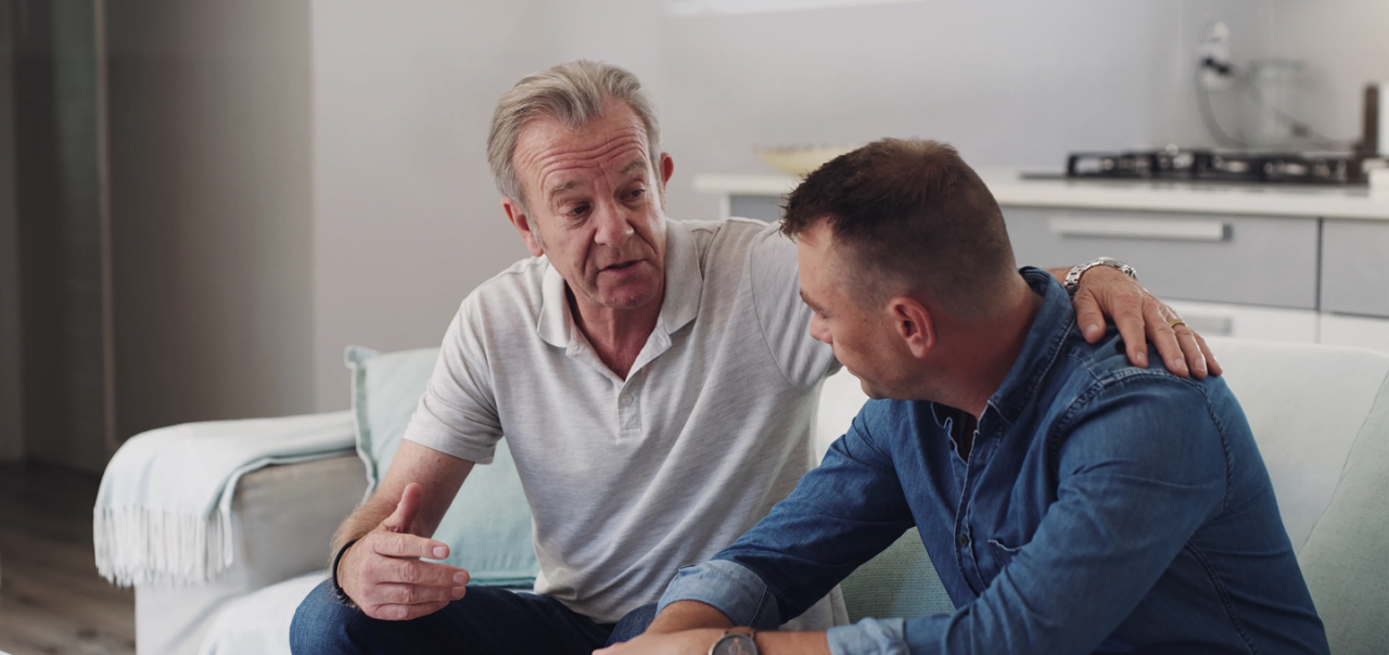 two men conversing