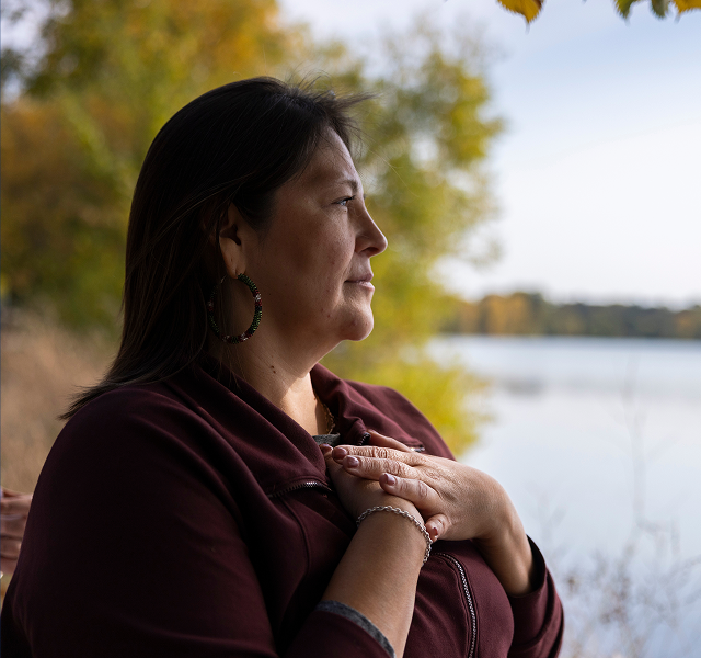 woman looking at a lake